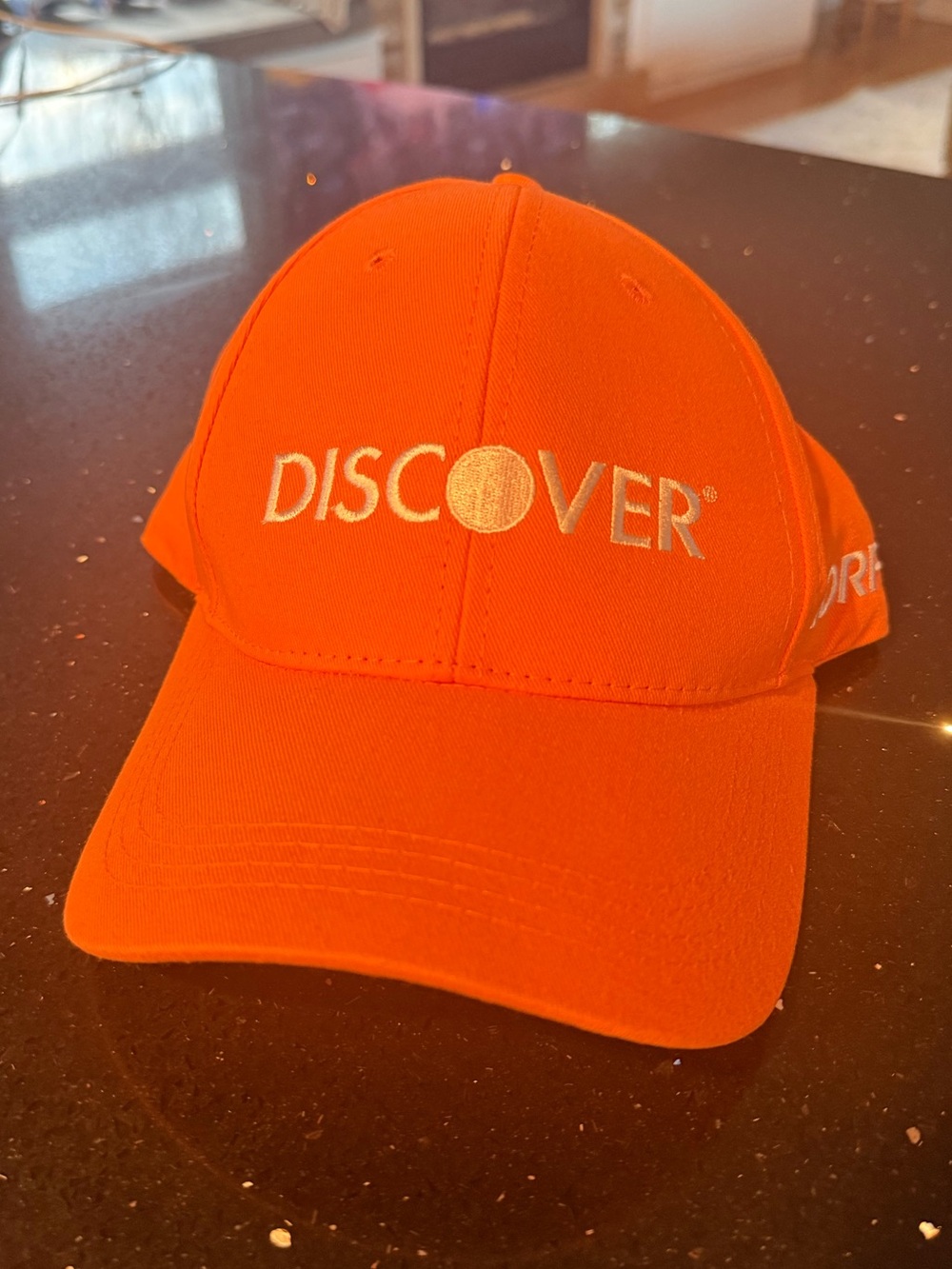 Discovery Bright Orange Logo Baseball Hat